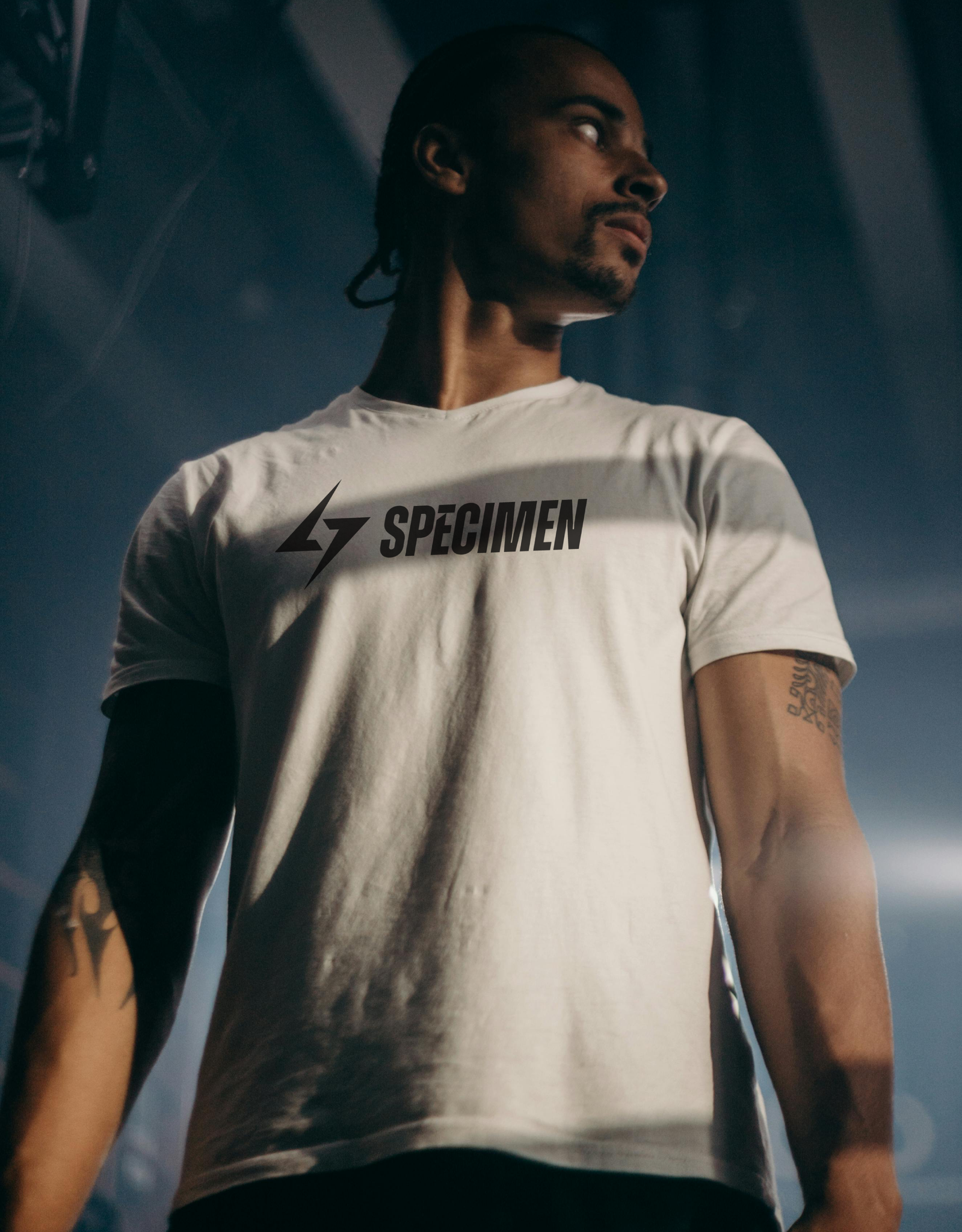 Men wearing Specimen engineered gym T-shirt — breathable workout apparel for training